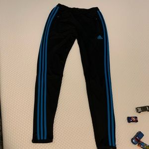 Black and blue adidas joggers